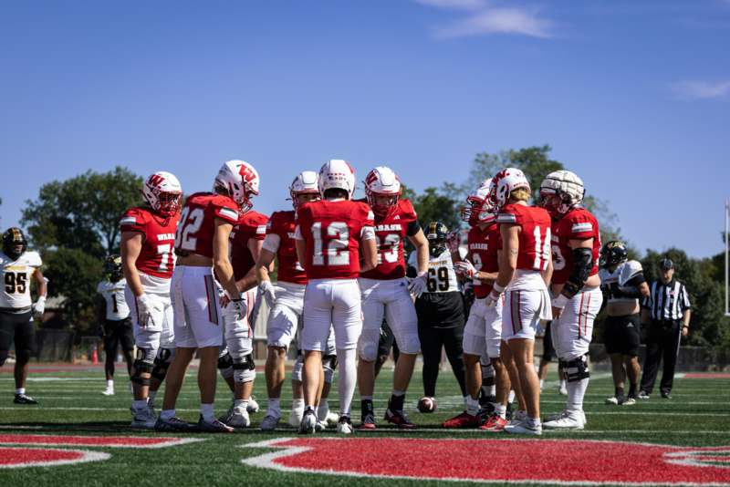 a group of football players on a field