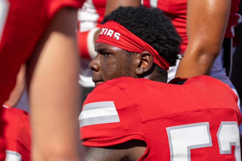 a football player in red jersey