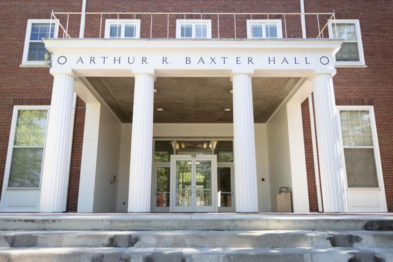 a building with columns and a door