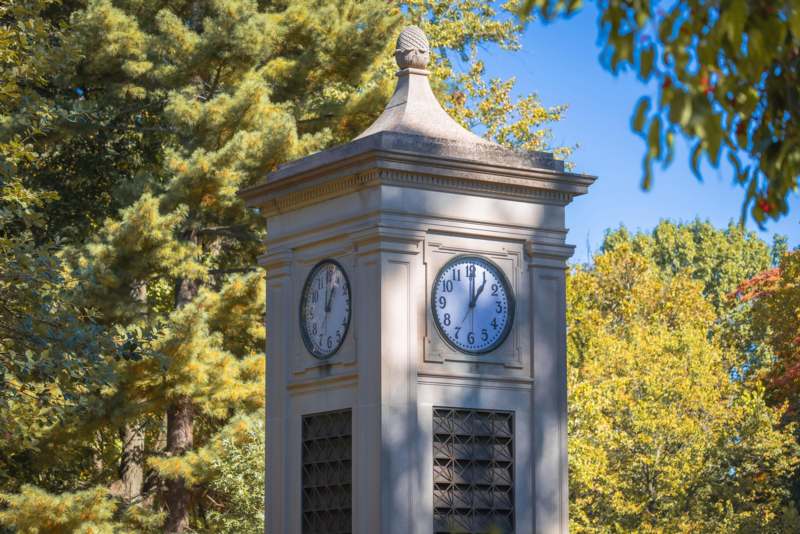 a clock tower with a couple of clocks on it