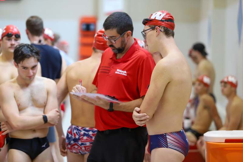 a group of men in swim suits