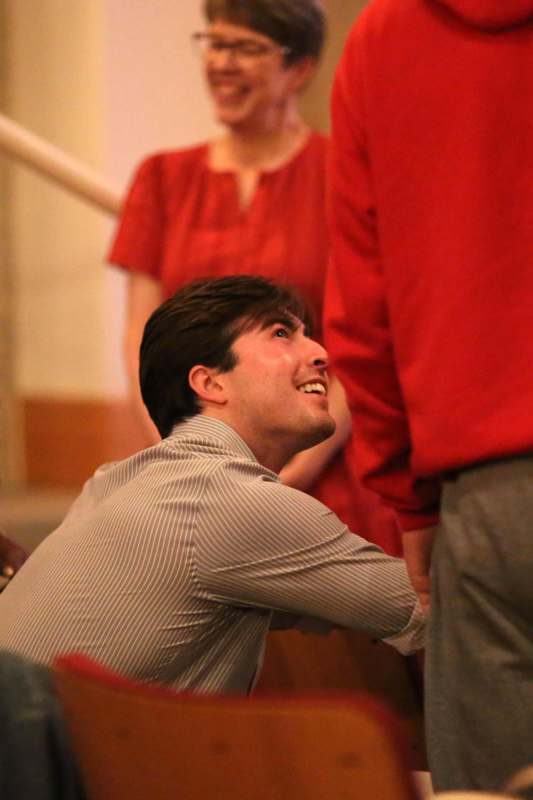 a man looking up at another man