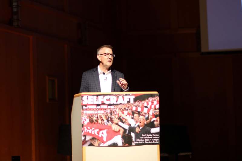 a man standing at a podium