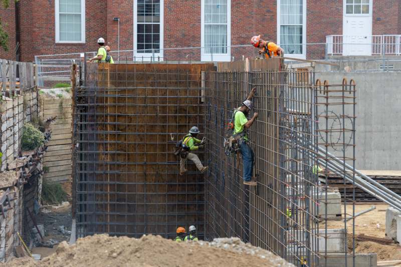 a group of men working on a construction site