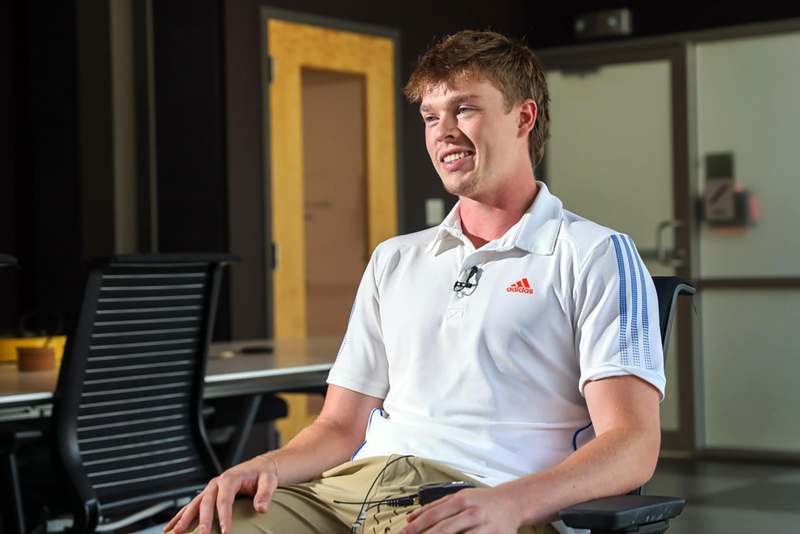 a man sitting in a chair