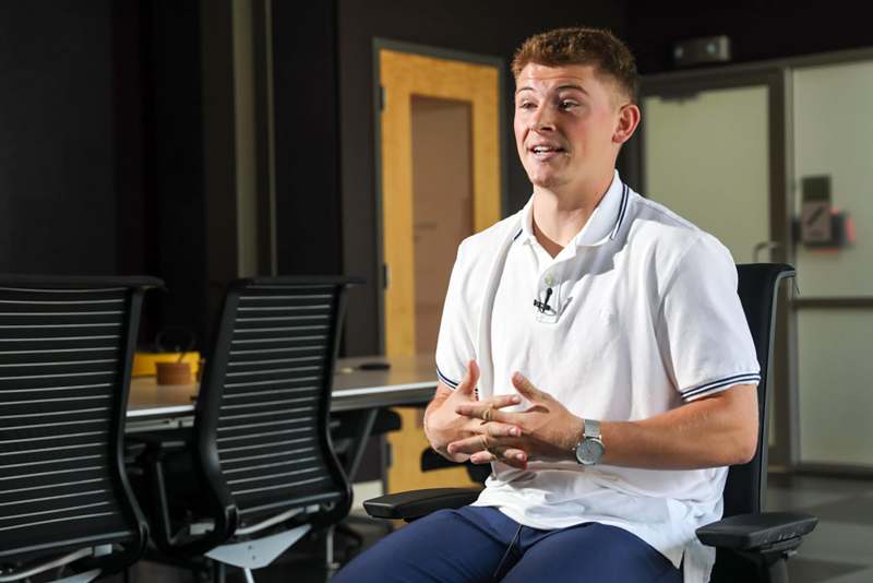 a man sitting in a chair
