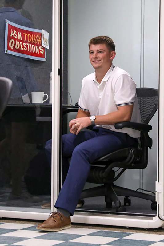 a man sitting in a chair