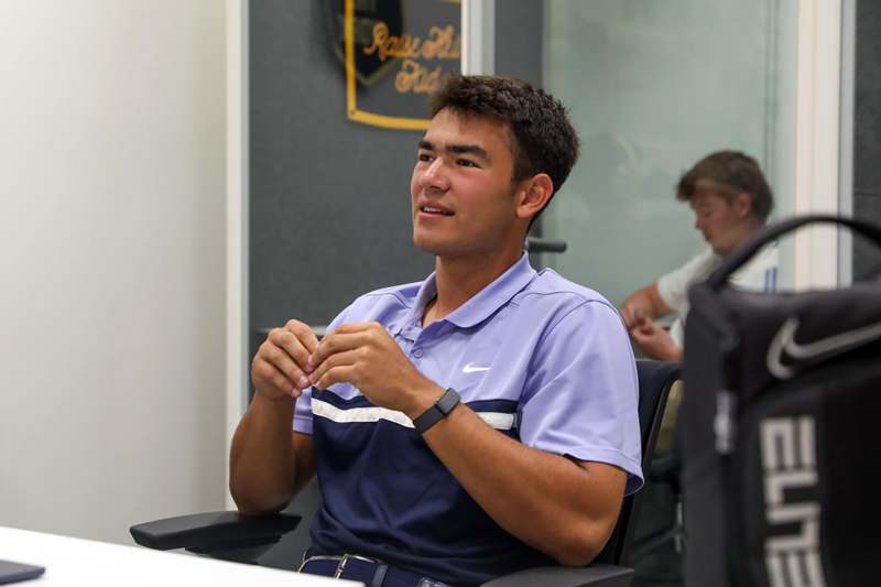 a man sitting in a chair