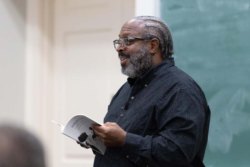 a man holding a book