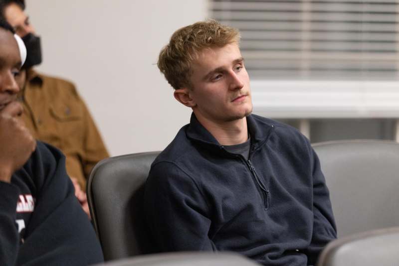 a man sitting in a chair