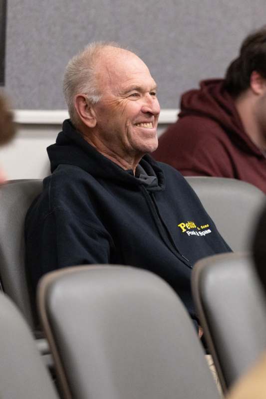 a man sitting in a chair