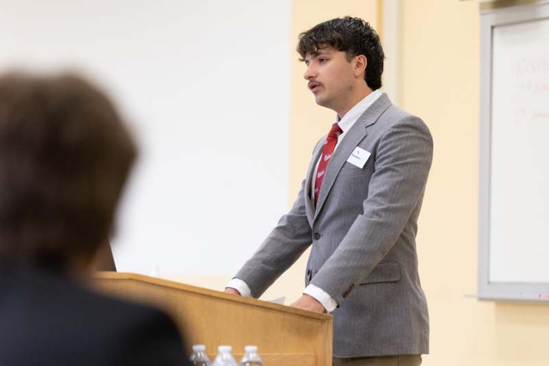 a man standing at a podium