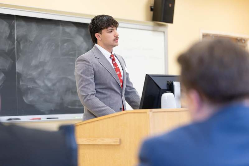 a man standing in front of a podium