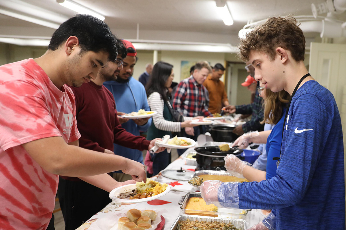 Wabash students attending a community Thanksgiving dinner